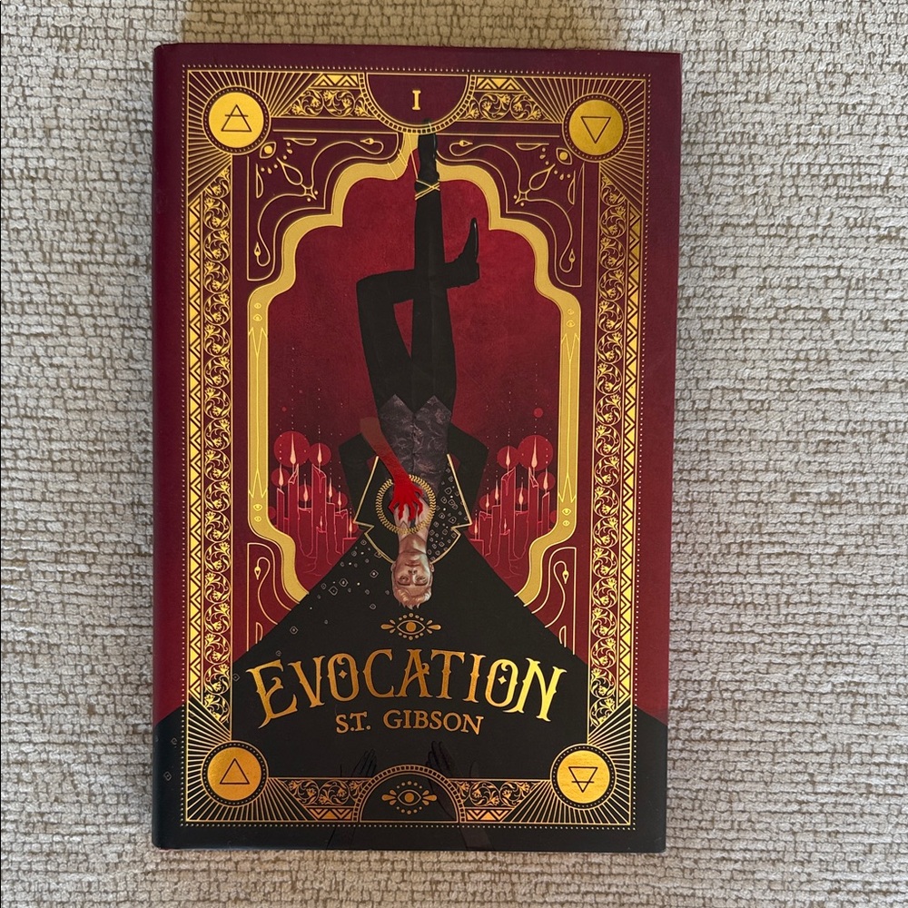 Evocation Hardcover Book with Red and Gold Cover